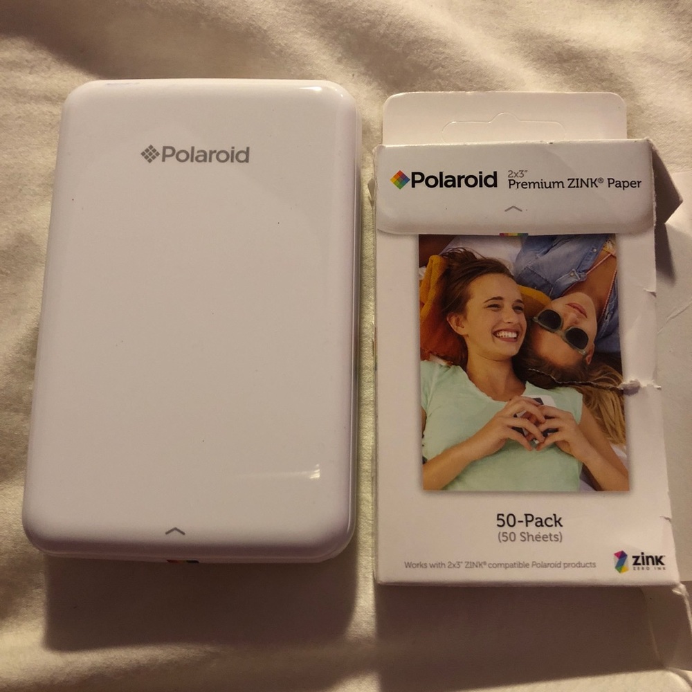 Polaroid zip printer with refilling paper